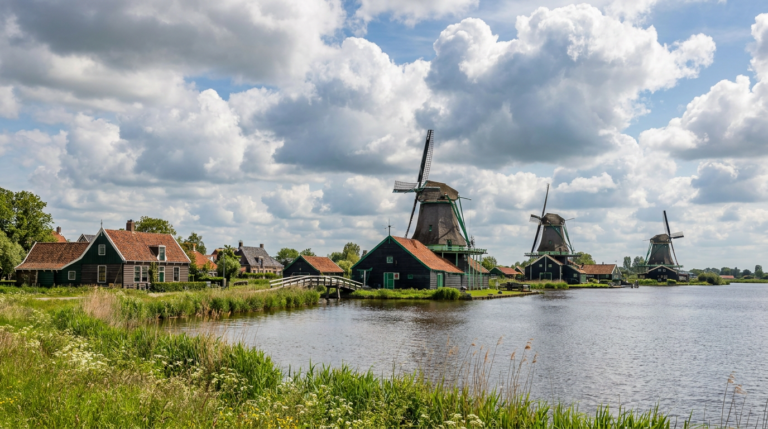 Green windmills along the river at Zaanse Schans